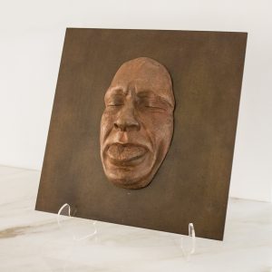 Plaque marron La moquerie